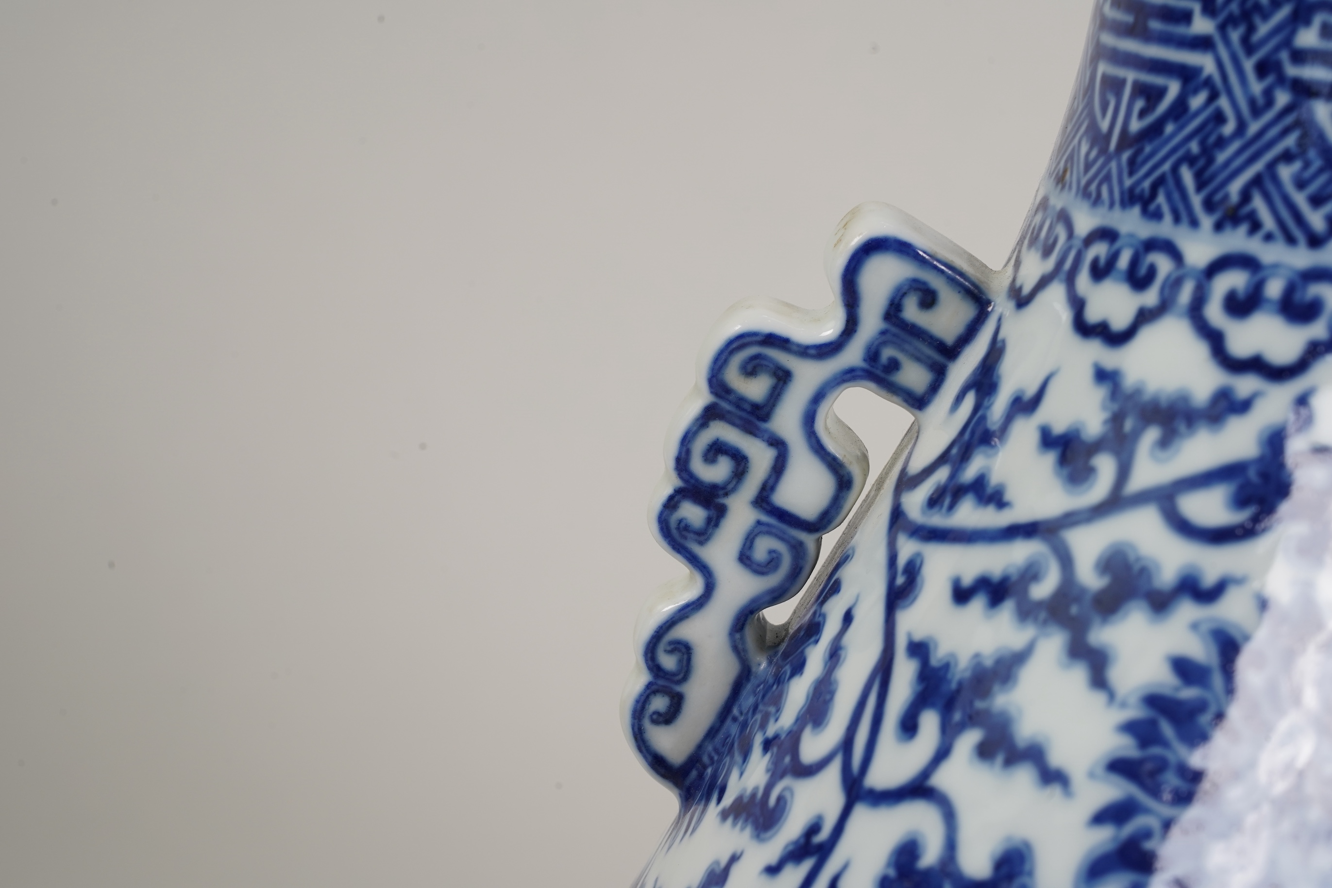 A large Chinese blue and white pear shaped vase, hu, Qianlong seal mark but later
